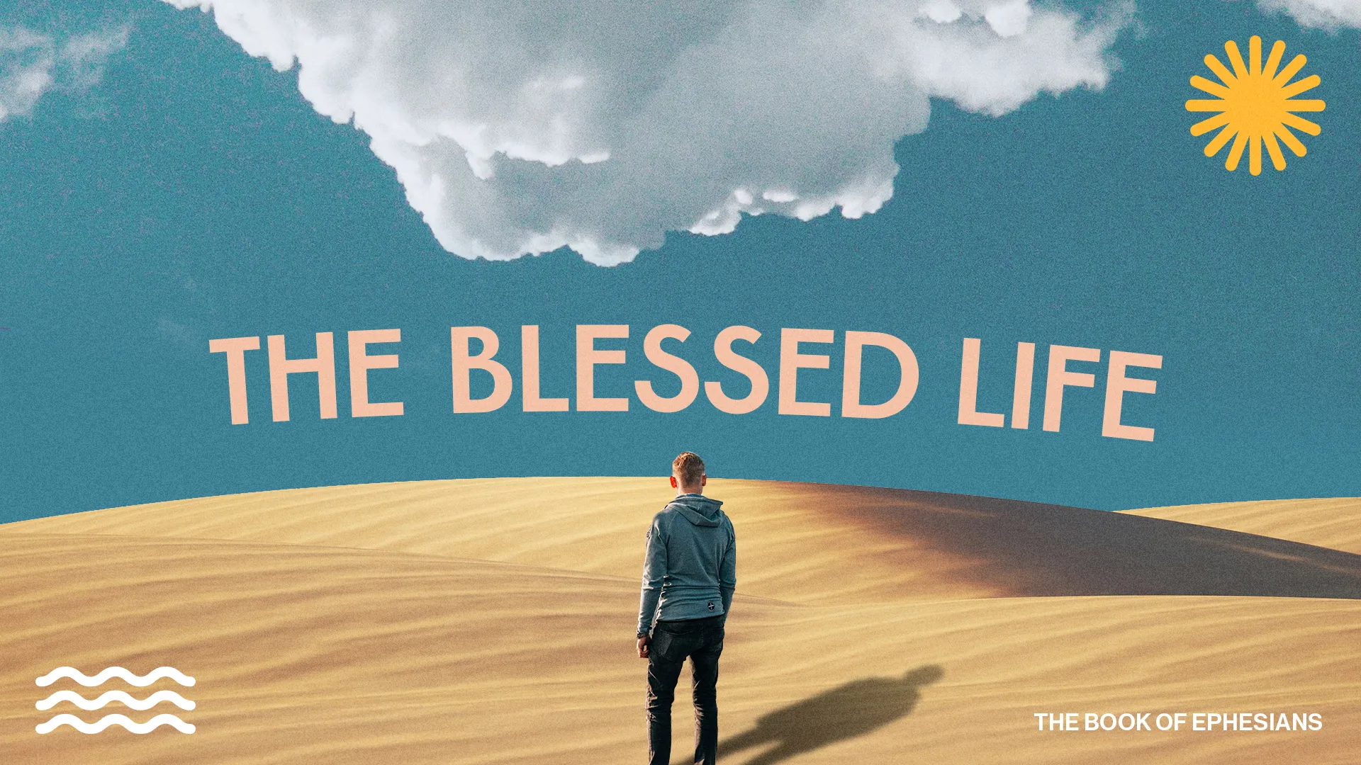Person stands on a sandy landscape under a blue sky, contemplating "The Blessed Life" from the Book of Ephesians.