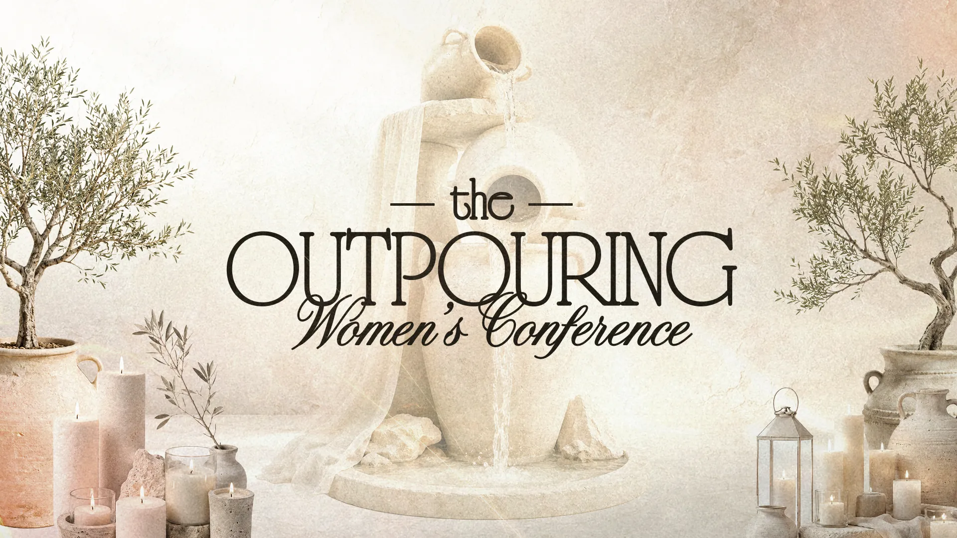 Olive branches and candles surround elegant pottery, highlighting the theme of the Outpouring Women's Conference.
