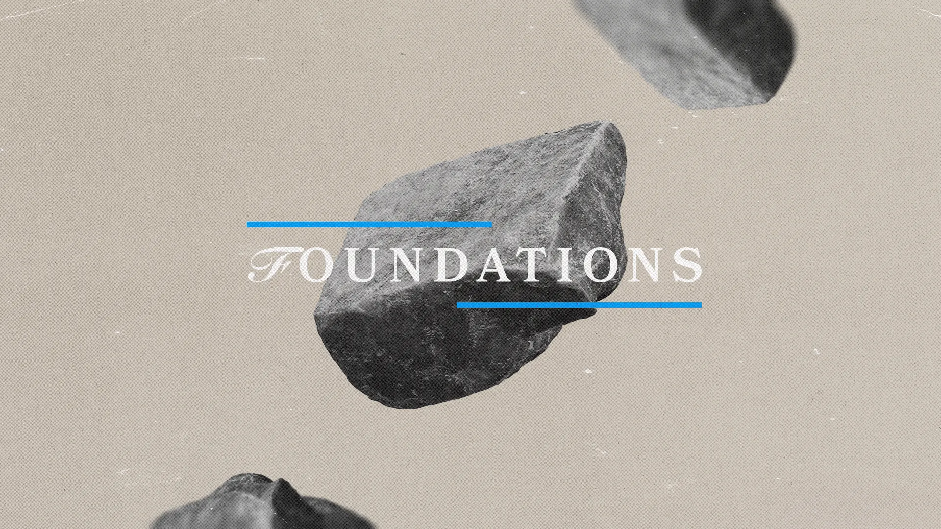 Rocks suspended against a neutral background, highlighting the theme of "Foundations" in faith and community.
