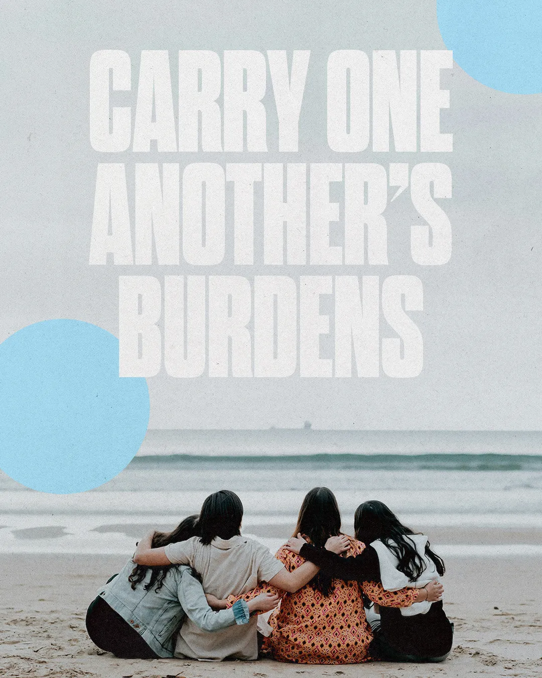 Friends embrace on the beach, symbolizing community and support, with the message "Carry one another's burdens."