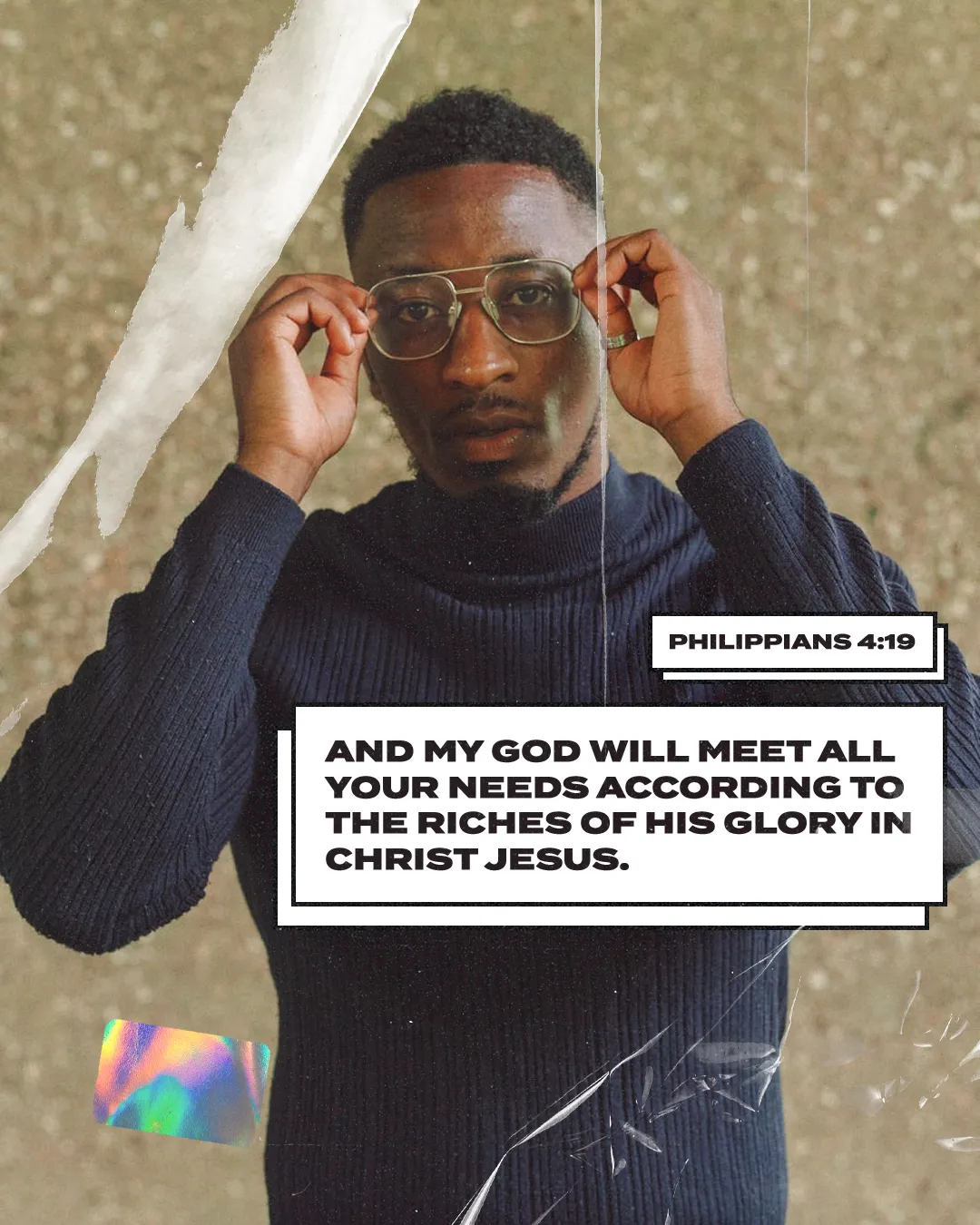 Young man adjusting glasses, with a biblical quote from Philippians 4:19, symbolizing faith and divine provision.