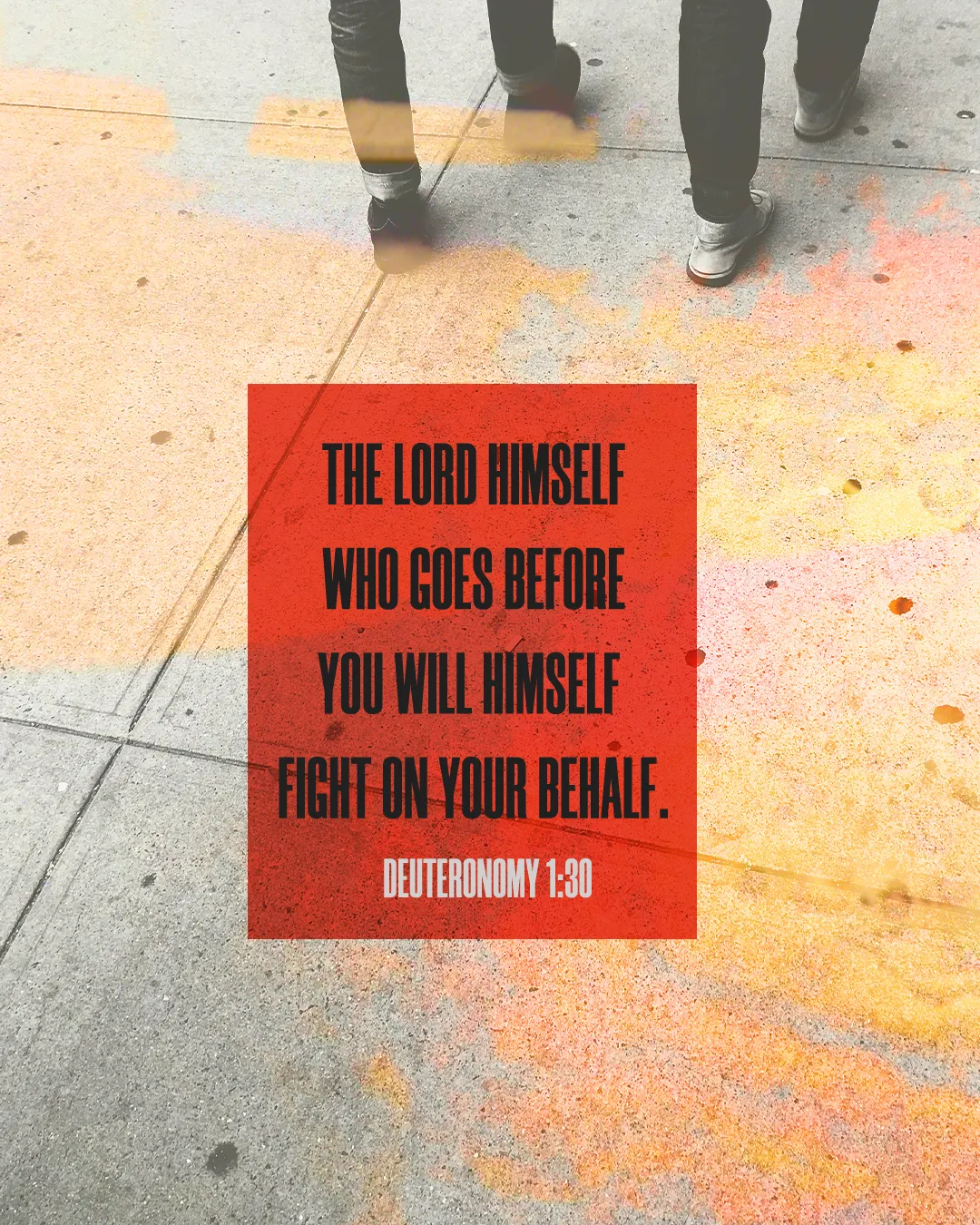 Verse from Deuteronomy 1:30 on sidewalk background, symbolizing guidance and divine protection in life's journey.