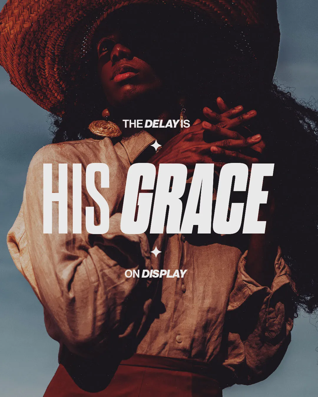 "The Delay is His Grace on Display" text overlay on portrait of person in hat and earth tone clothing for church grace message media