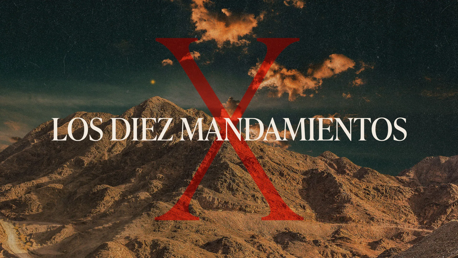 Los Diez Mandamientos church media graphic with dramatic desert mountain landscape, stormy orange sky, and bold red triangle overlay with white Spanish typography