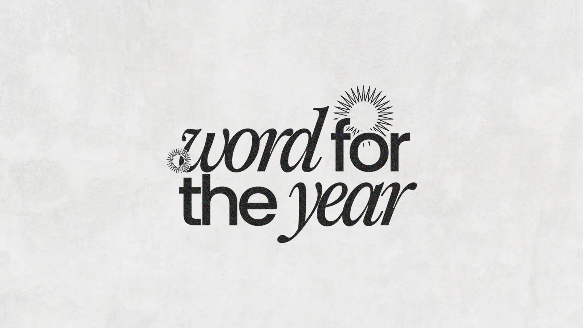 Minimalist black and white typographic design reading "word for the year" with decorative sun elements on textured background