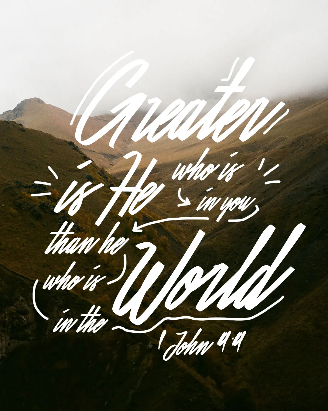 Inspirational church media featuring 1 John 4:4 "Greater is He who is in you than he who is in the World" with artistic hand-lettering overlaid on a dramatic mountain landscape.