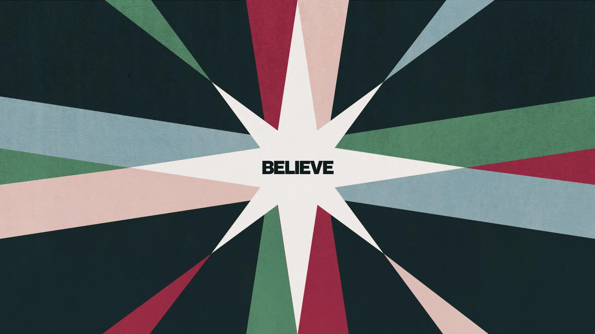 Minimalist starburst design with "Believe" text centered on white star shape with red, green, pink and teal radiating beams