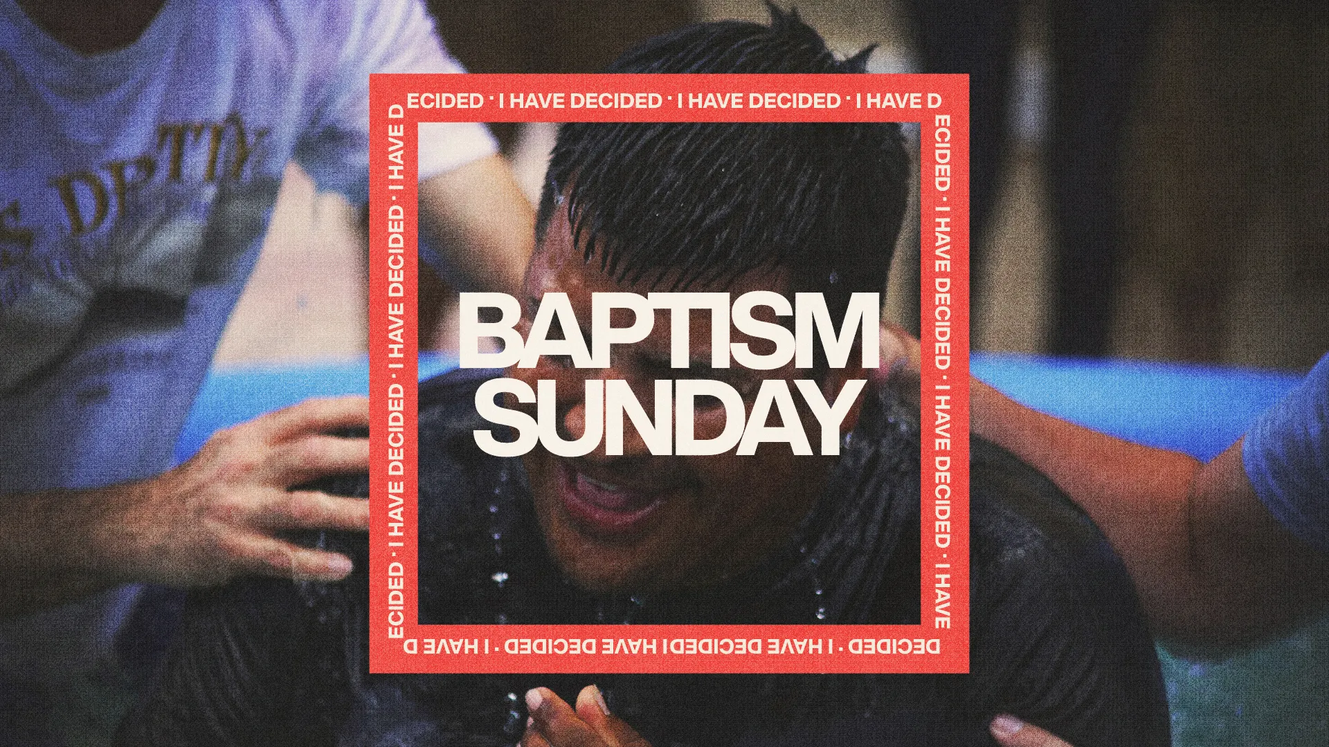 Joyful baptism celebration with a participant surrounded by supportive hands, signifying faith and community.