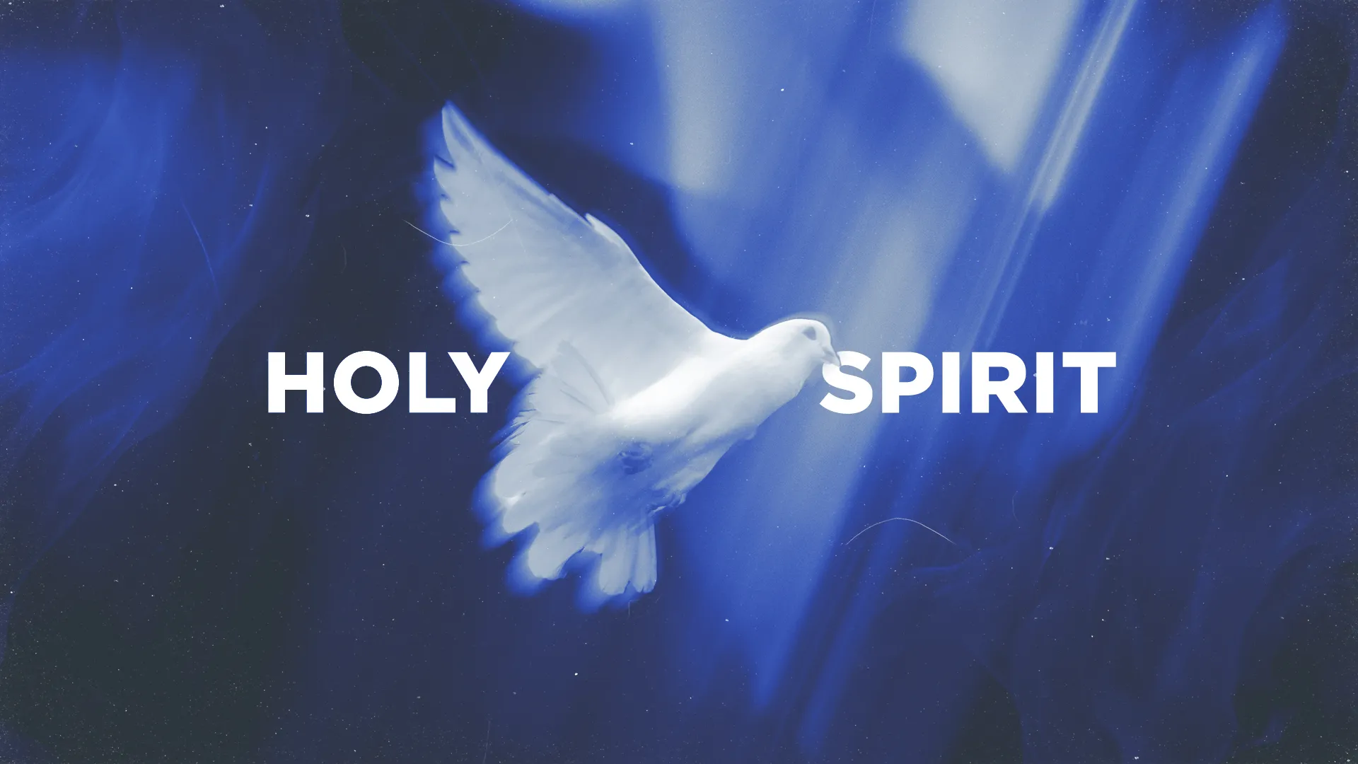 Photo-driven church media graphic with a white dove flying through beams of blue light, with the text "Holy Spirit" split on either side of the dove.