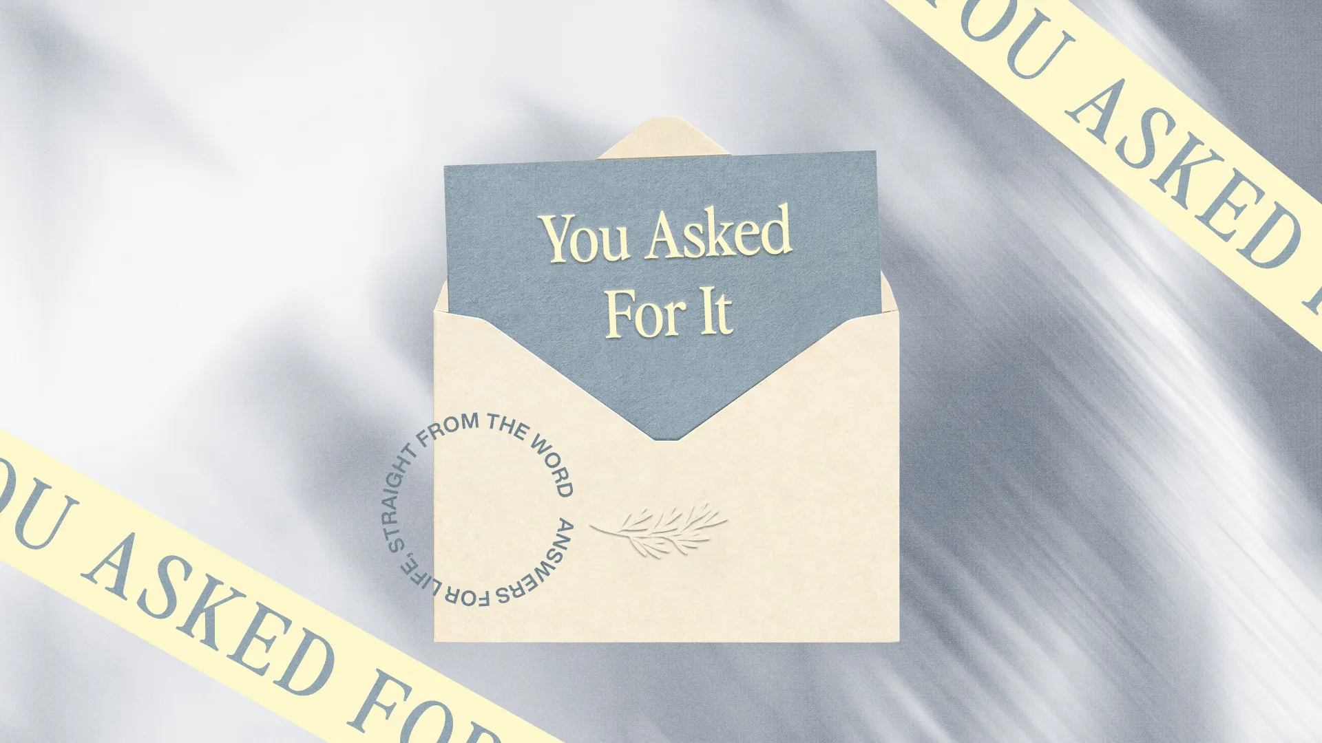 Envelope with a card reading "You Asked For It," symbolizing community questions and faith-based discussions.