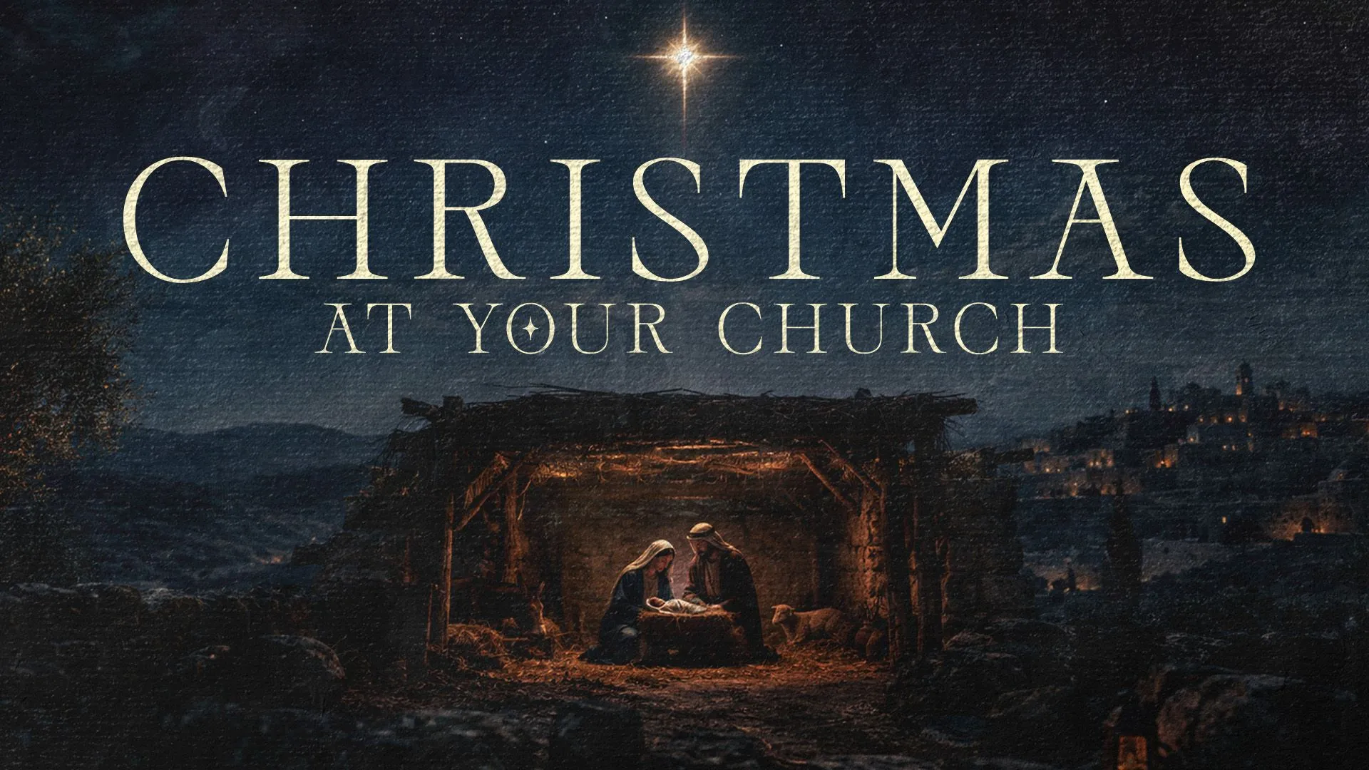 The word CHRISTMAS in cream serif type over a night nativity scene with a star above the stable and Bethlehem in the hills