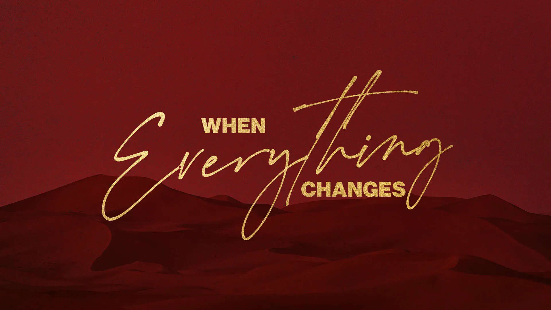 "When Everything Changes" in gold script and block type over red desert dunes and a deep burgundy sky