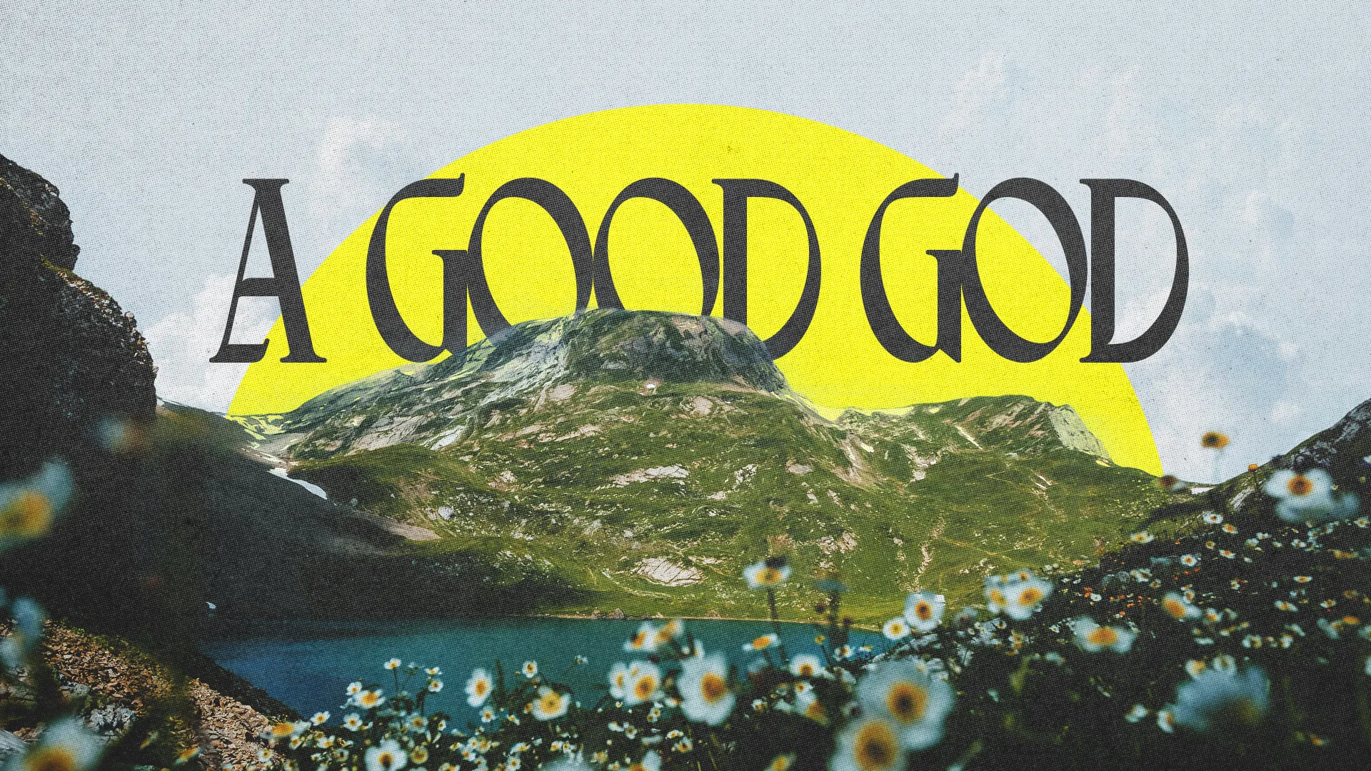 Majestic mountains and flowers with the text "A Good God," symbolizing faith, nature, and divine goodness.