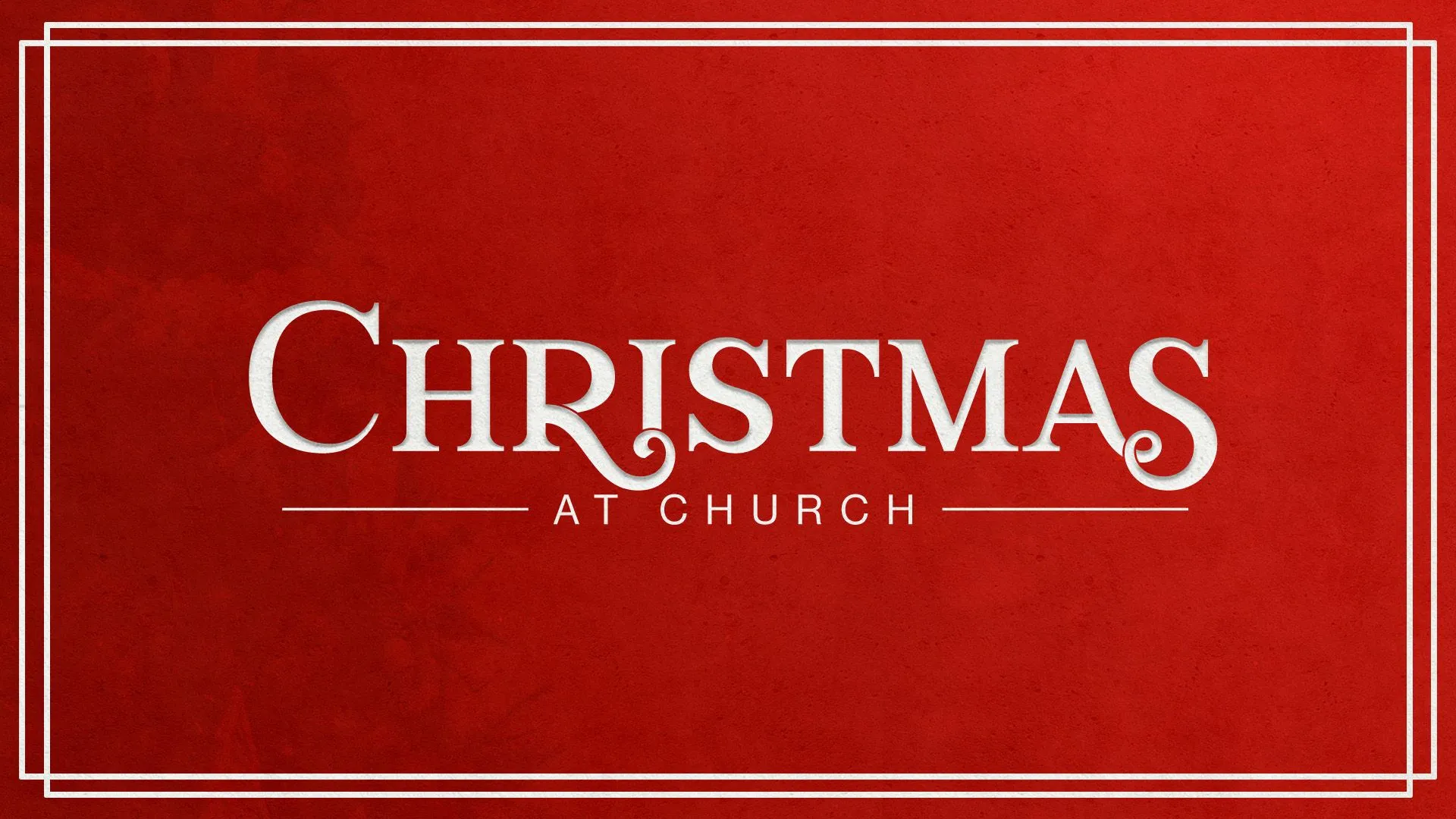 The word Christmas in cream serif lettering on a deep red background inside a thin double white border