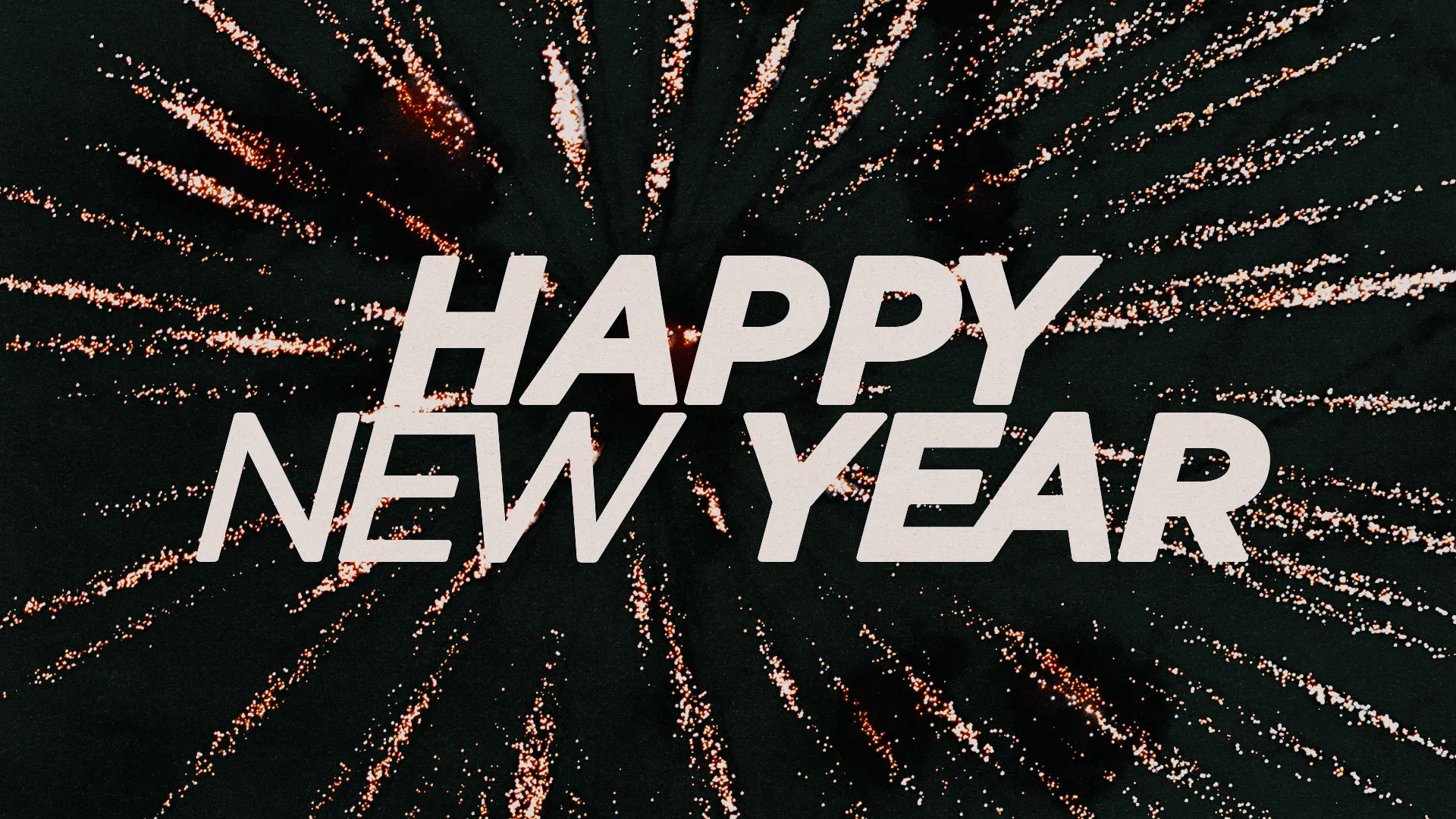 Bold text "Happy New Year" with radiant sparkles, symbolizing hope, renewal, and community celebrations in faith.