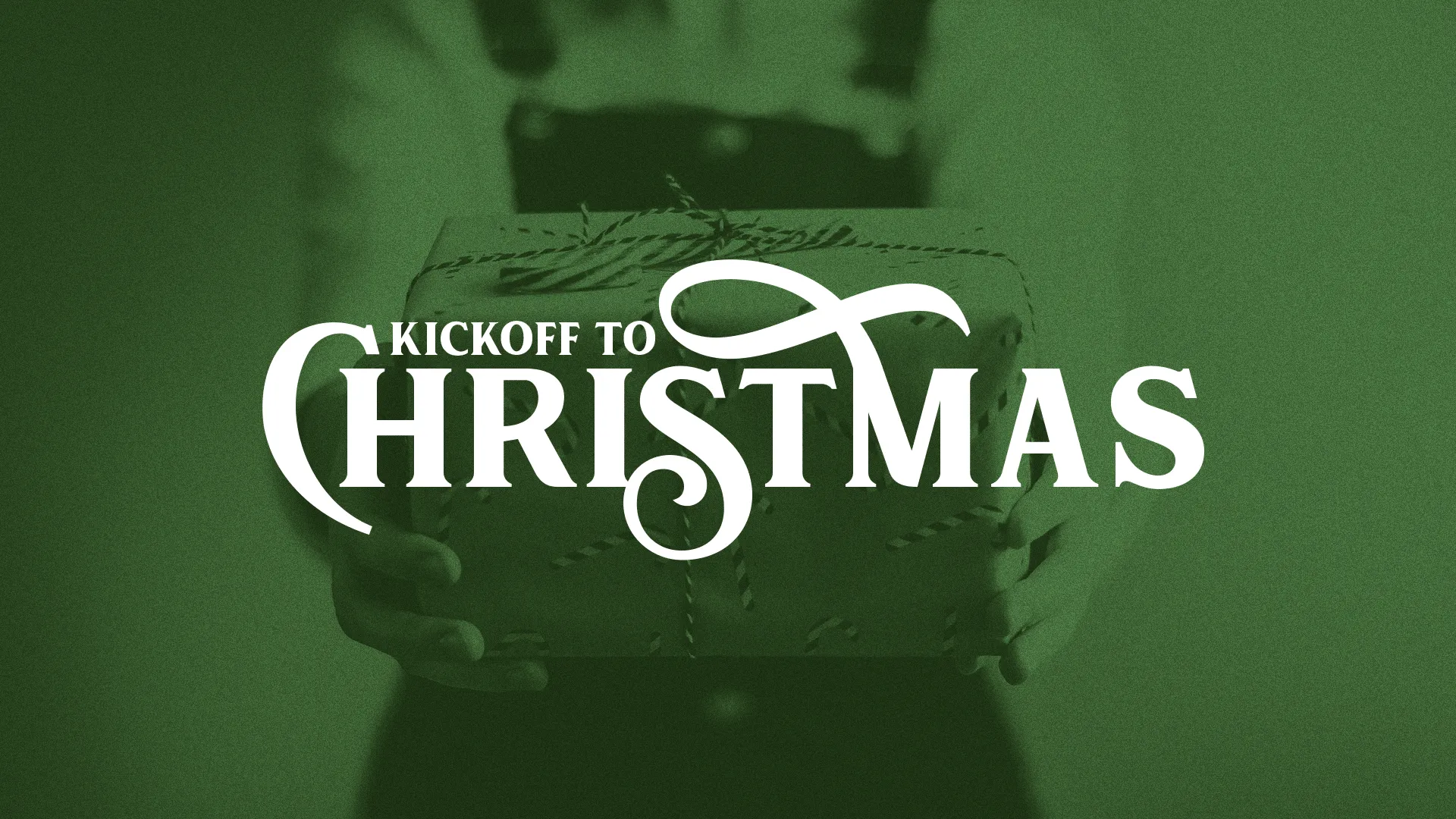 Hands holding a beautifully wrapped gift, symbolizing the joy of giving and the start of the Christmas season.