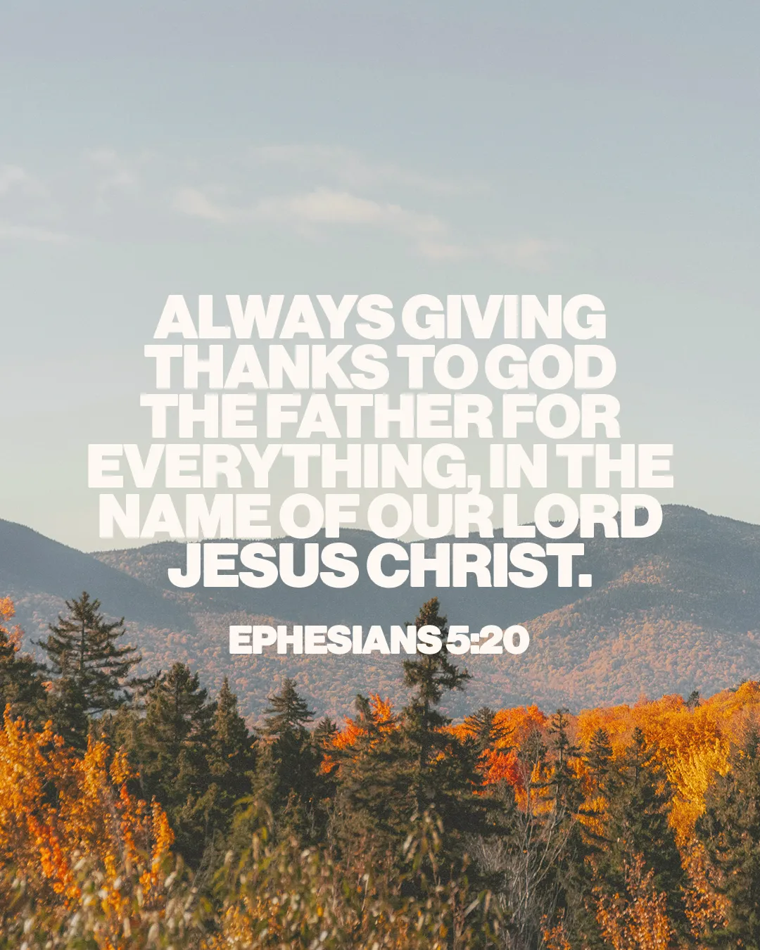 "Autumn landscape with mountains and trees, featuring Ephesians 5:20 about gratitude to God in Jesus' name."