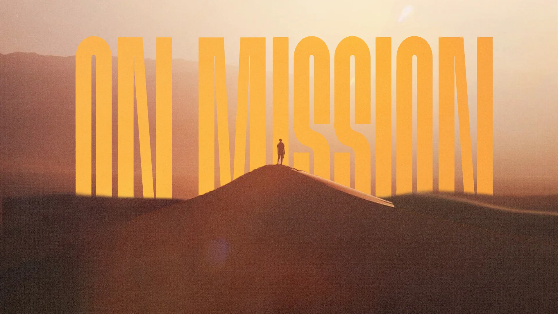 Silhouette of a person standing on a hill at sunset, symbolizing faith, mission, and spiritual journey.