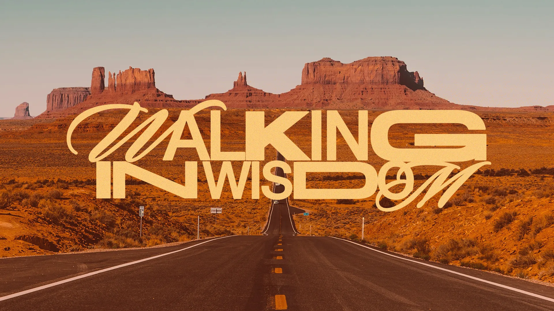 Desert road leading to majestic mountains, with the phrase "Walking in Wisdom" symbolizing faith and spiritual journey.