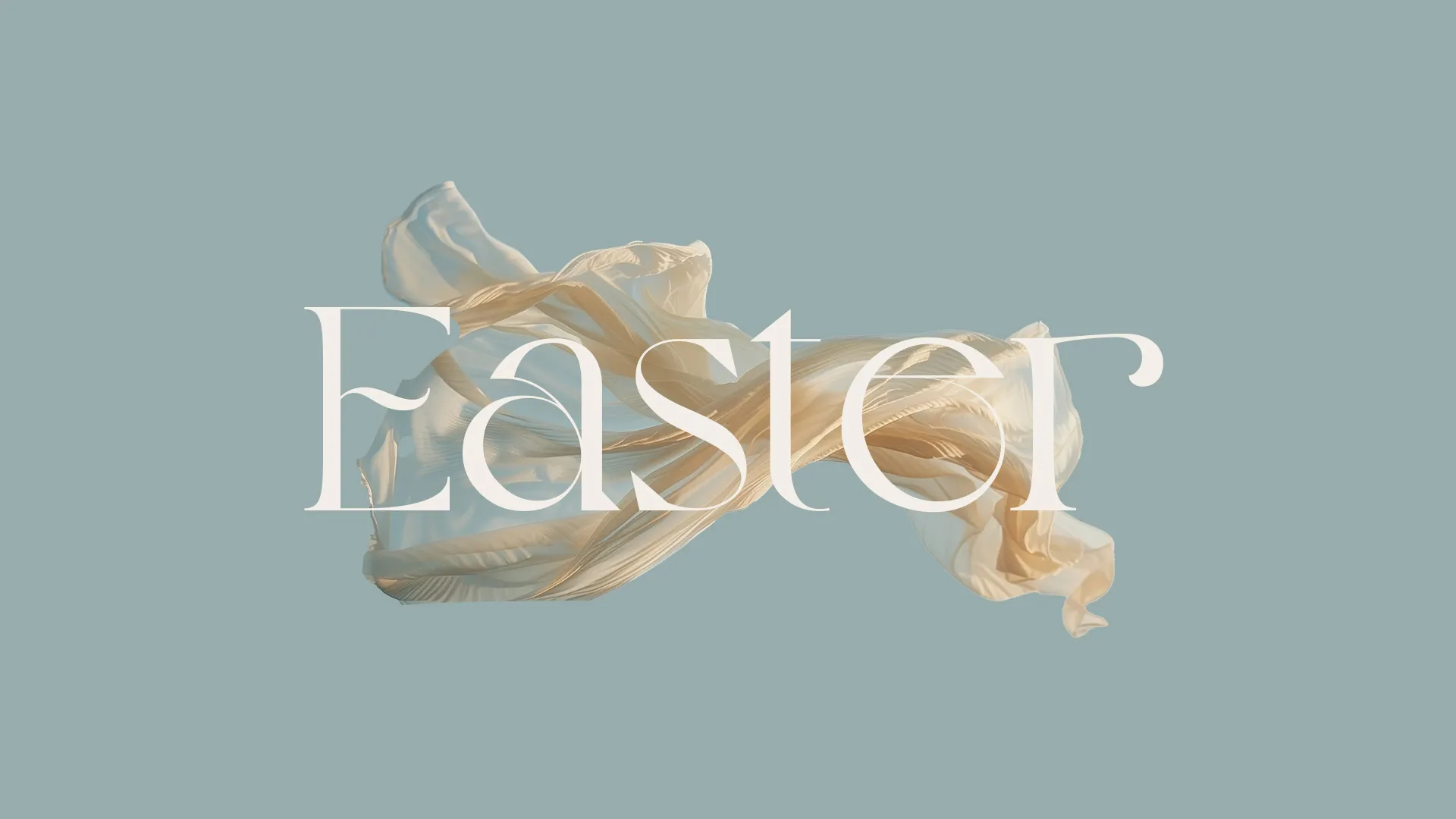 Flowing fabric with the word "Easter" symbolizes renewal, hope, and the celebration of resurrection in faith.
